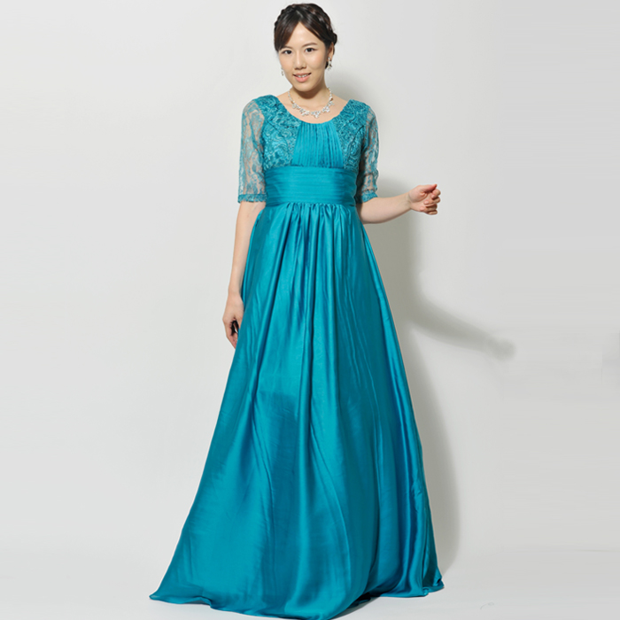 ターコイズブルーカラーの爽やかで上品な雰囲気を感じさせる袖付きロングドレス