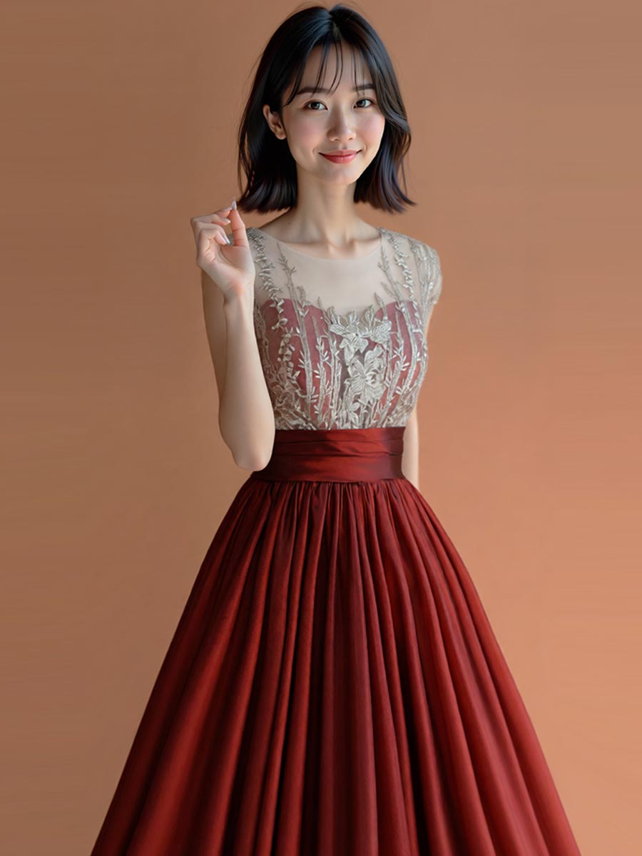 コッパーカラーの色合いを持たせたタフタの光沢が美しい胸元シルバー装飾デザインのロングドレス